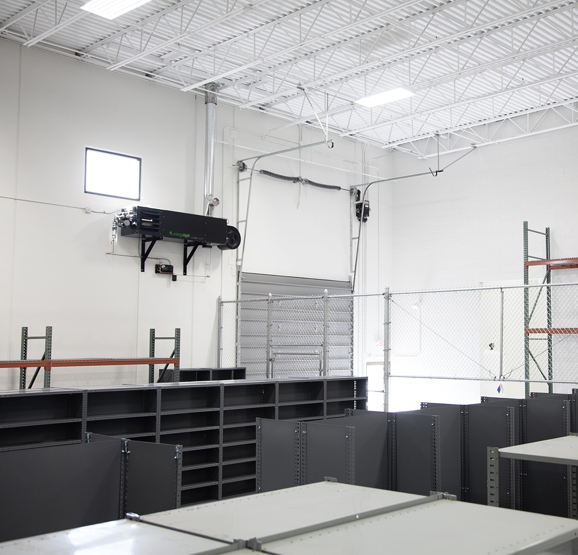 Warehouse Interior with Boxes Stacked to Ceiling